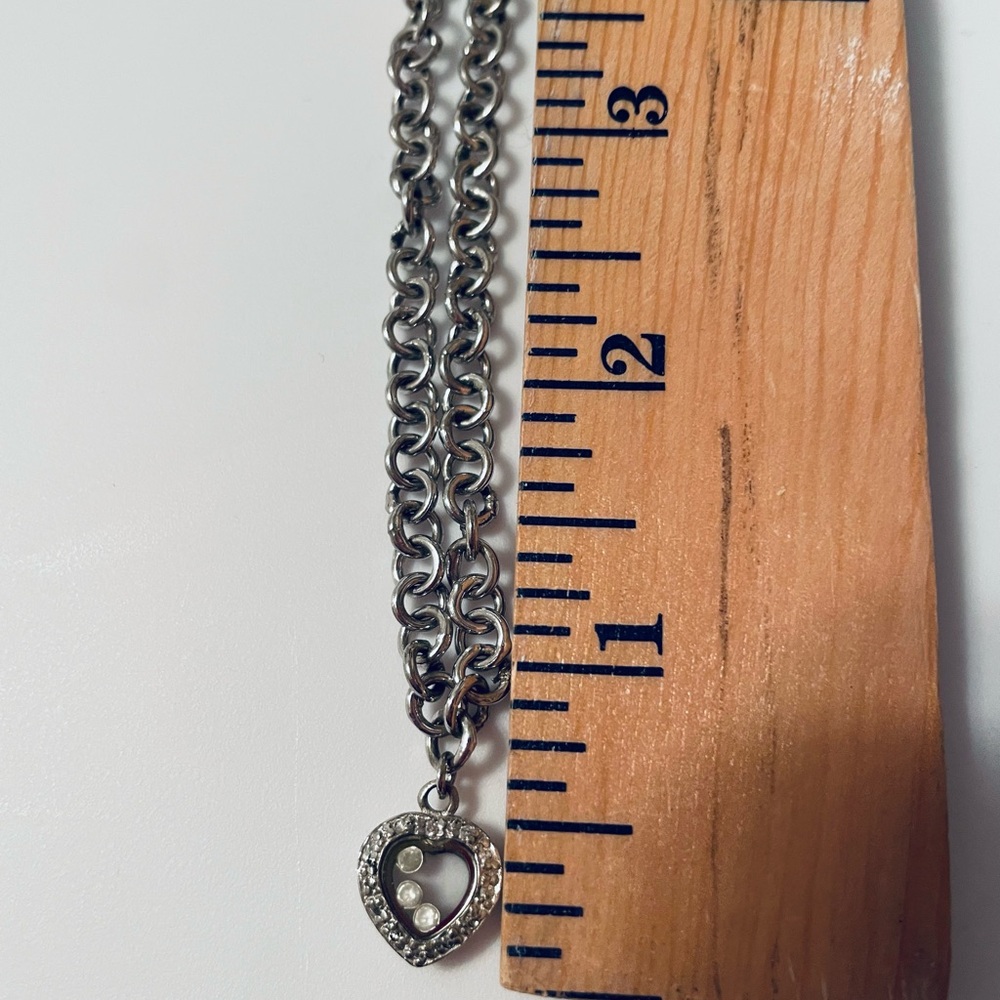 Silver toned heart necklace with crystal beads on the interior of glass chain - Picture 9 of 11